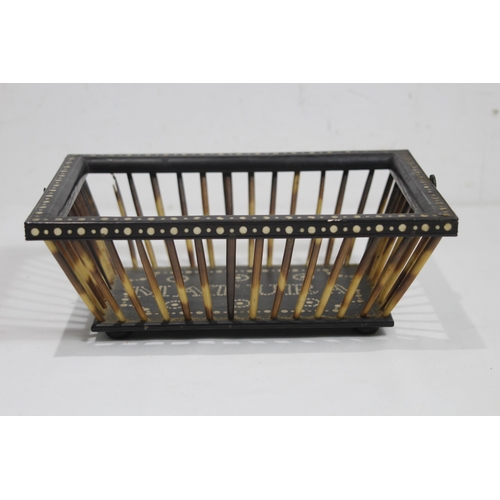 545 - SMALL ANTIQUE PORCUPINE AND HARDWOOD BASKET
19 x 26 x 9CM