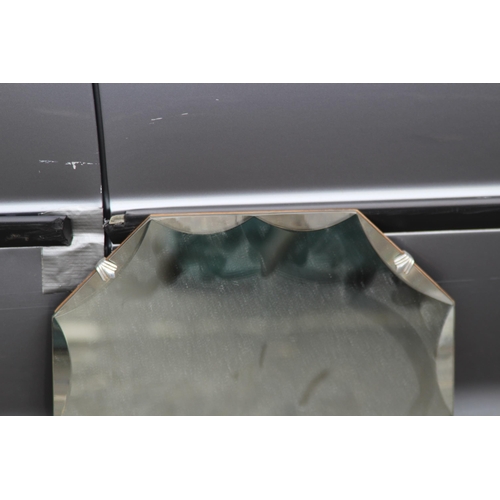 104 - THREE MISCELLANEOUS MIRRORS
70 X 50CM