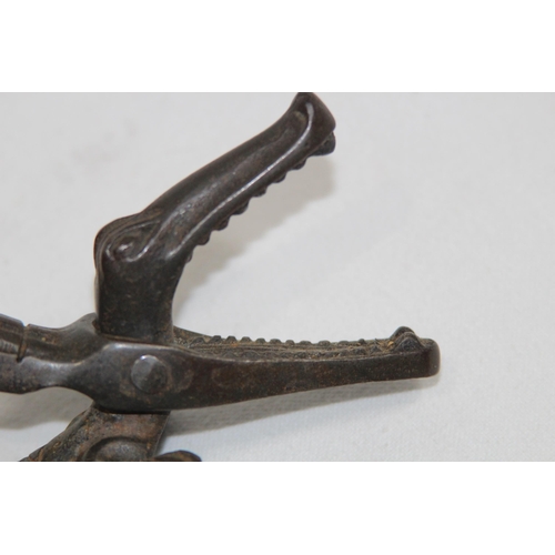 567 - NOVELTY 19TH CENTURY CAST IRON NUTCRACKER IN THE FORM OF A CROCODILE
23cm