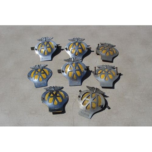 580 - 8 VINTAGE AA BADGES