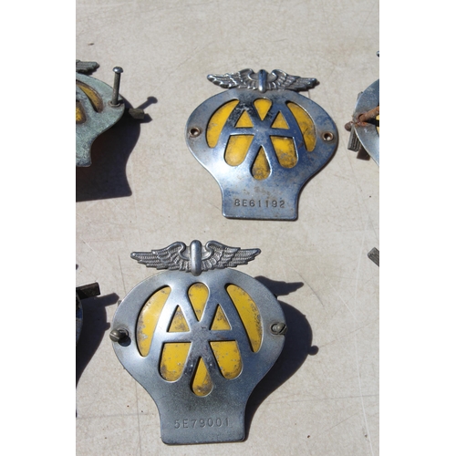 581 - 8 VINTAGE AA BADGES