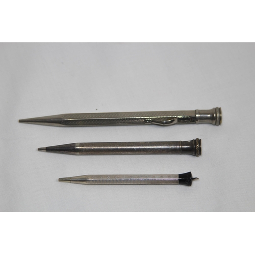564 - THREE VINTAGE PROPELLING PENCILS