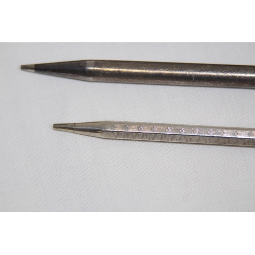 564 - THREE VINTAGE PROPELLING PENCILS
