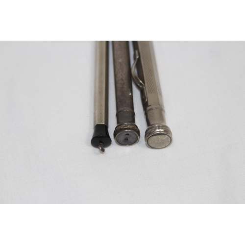 564 - THREE VINTAGE PROPELLING PENCILS