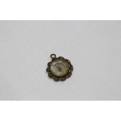 565 - VINTAGE PENDANT COMPASS