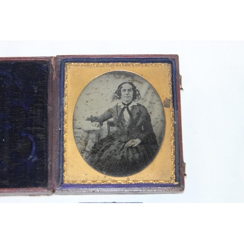 570 - VICTORIAN DURATYPE LEATHER CASED GLASS PHOTO AND ANOTHER
9.5 X 8CM