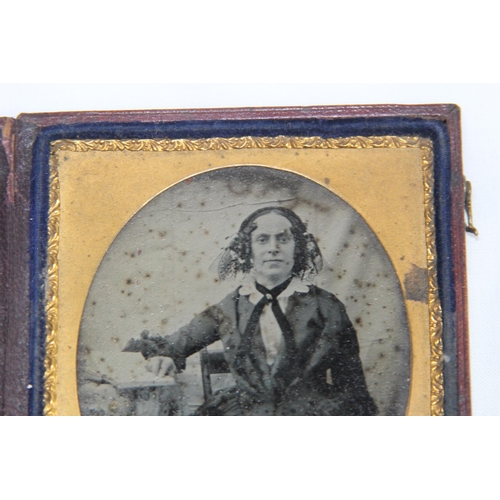 570 - VICTORIAN DURATYPE LEATHER CASED GLASS PHOTO AND ANOTHER
9.5 X 8CM