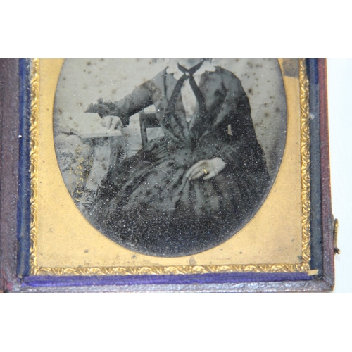 570 - VICTORIAN DURATYPE LEATHER CASED GLASS PHOTO AND ANOTHER
9.5 X 8CM