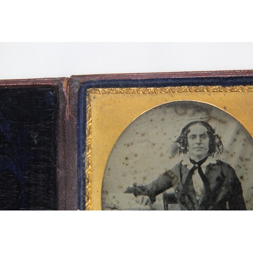 570 - VICTORIAN DURATYPE LEATHER CASED GLASS PHOTO AND ANOTHER
9.5 X 8CM