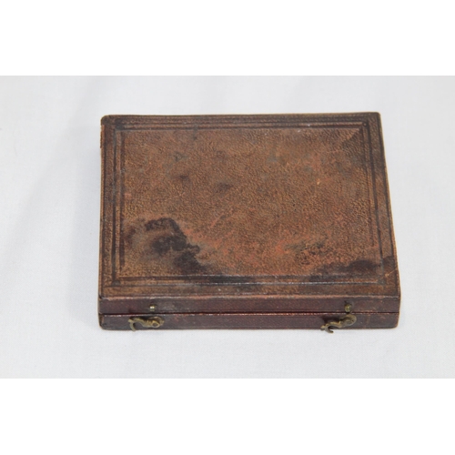 570 - VICTORIAN DURATYPE LEATHER CASED GLASS PHOTO AND ANOTHER
9.5 X 8CM
