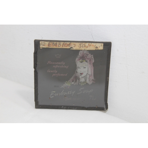 571 - THREE VINTAGE ADVERTISING GLASS PLATES, INC CINEMATOGRAPHY FOR LYSTLITE WITH BARBARA BRITTON IN PARA... 