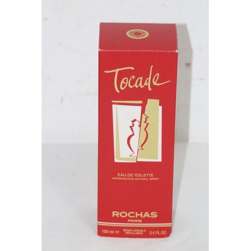 595 - BOTTLE OF VINTAGE ROCHAS TOCADE PERFUME