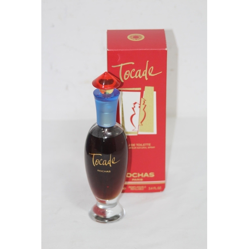 595 - BOTTLE OF VINTAGE ROCHAS TOCADE PERFUME