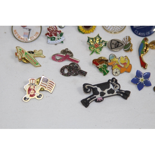 QUANTITY OF MISCELLANEOUS BADGES AND PINS