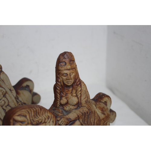 TWO QUANTOCK POTTERY FIGURES - KING ARTHUR AND GUINEVERE ON HORSEBACK 23CM