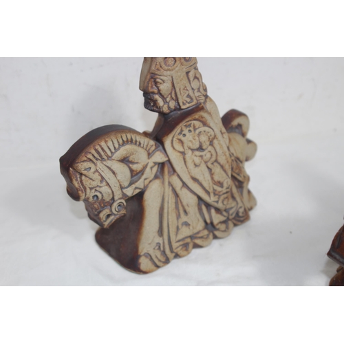 TWO QUANTOCK POTTERY FIGURES - KING ARTHUR AND GUINEVERE ON HORSEBACK 23CM