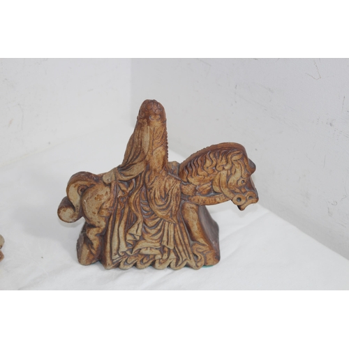TWO QUANTOCK POTTERY FIGURES - KING ARTHUR AND GUINEVERE ON HORSEBACK 23CM