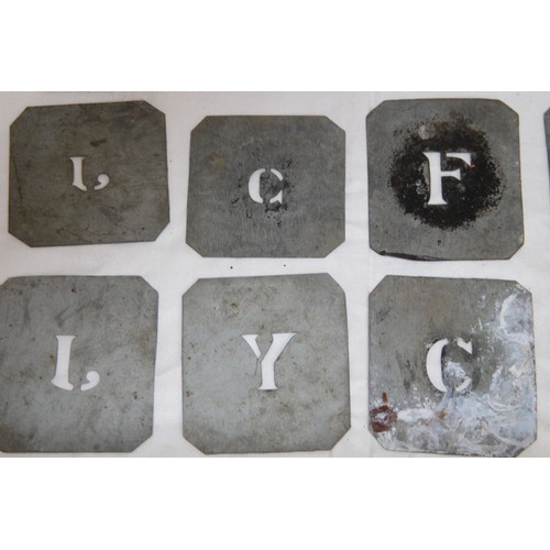716 - QUANTITY OF ANTIQUE METAL STENCIL LETTERS