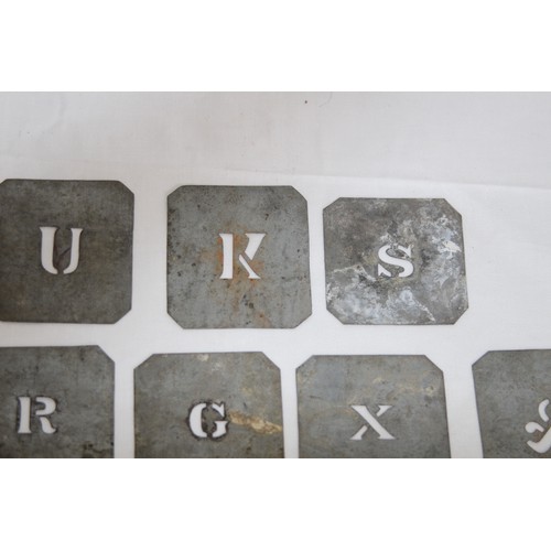 716 - QUANTITY OF ANTIQUE METAL STENCIL LETTERS