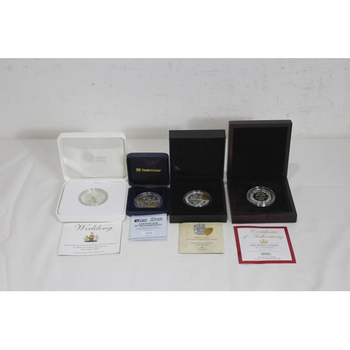 797 - FOUR BOXED SILVER COMMEMORATIVE COINS