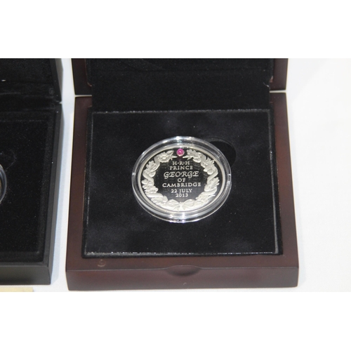 797 - FOUR BOXED SILVER COMMEMORATIVE COINS