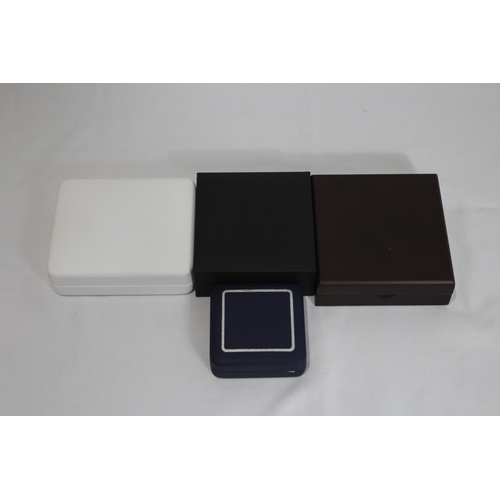 797 - FOUR BOXED SILVER COMMEMORATIVE COINS