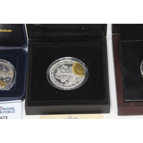 797 - FOUR BOXED SILVER COMMEMORATIVE COINS