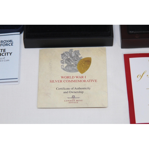 797 - FOUR BOXED SILVER COMMEMORATIVE COINS