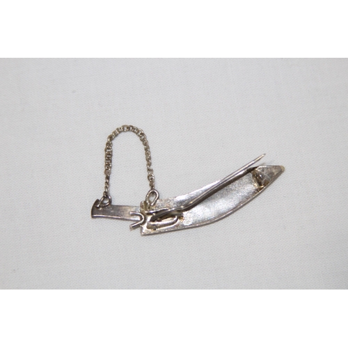 835 - VINTAGE SCOTTISH SWORD BROOCH, KUKRI BROOCH AND A LION