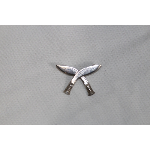 844 - SILVER KUKRI BROOCH