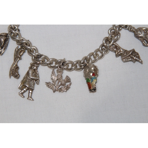 846 - SILVER CHARM BRACELET INCLUDING SPARE CHARMS - 43G