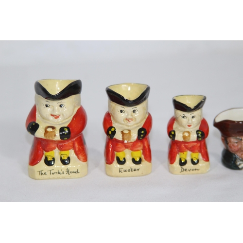 165 - QUANTITY OF MINIATURE TOBY JUGS MOSTLY ROYAL DOULTON
6cm