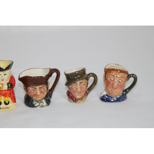 165 - QUANTITY OF MINIATURE TOBY JUGS MOSTLY ROYAL DOULTON
6cm