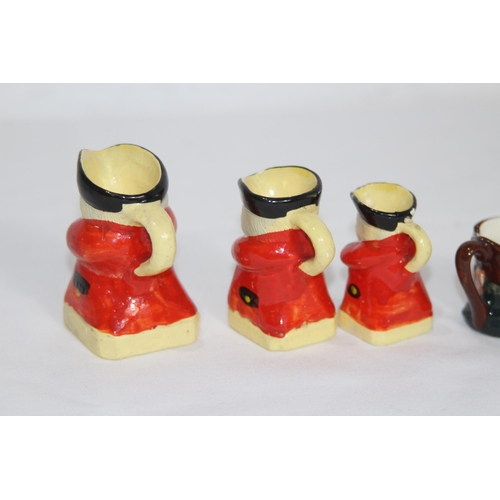 165 - QUANTITY OF MINIATURE TOBY JUGS MOSTLY ROYAL DOULTON
6cm