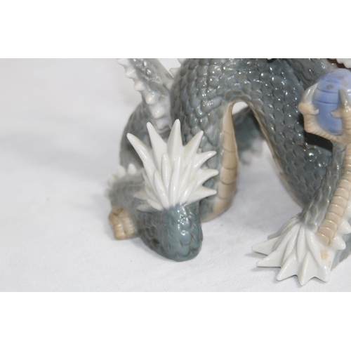 643 - VINTAGE YOSHYMI K PORCELAIN DRAGON
20 X 17CM