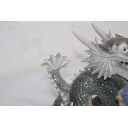 643 - VINTAGE YOSHYMI K PORCELAIN DRAGON
20 X 17CM