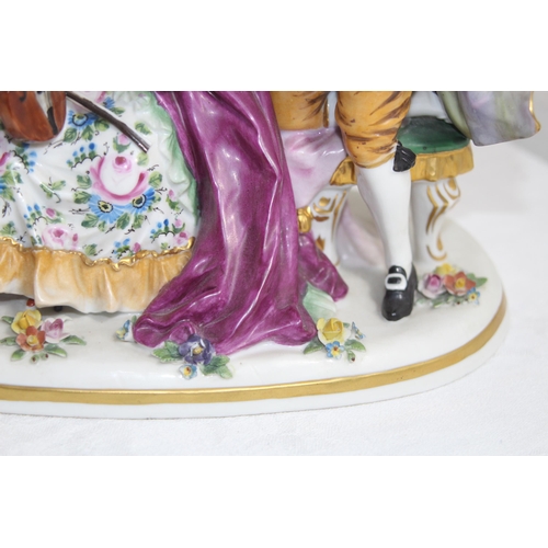 644 - ANTIQUE PORCELAIN MAN AND WOMEN FIGURE 
24 X 22CM