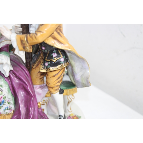 644 - ANTIQUE PORCELAIN MAN AND WOMEN FIGURE 
24 X 22CM