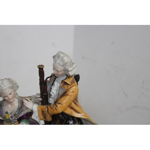 644 - ANTIQUE PORCELAIN MAN AND WOMEN FIGURE 
24 X 22CM