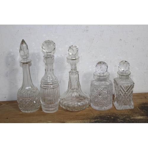 191 - LARGE QUANTITY OF MINIATURE DECANTERS 
21CM