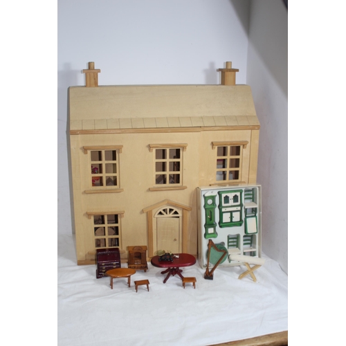 517 - WOODEN DOLLS HOUSE AND FURNITURE
60 X 25 X 69CM