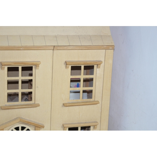 517 - WOODEN DOLLS HOUSE AND FURNITURE
60 X 25 X 69CM