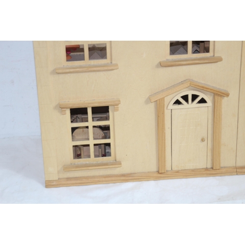 517 - WOODEN DOLLS HOUSE AND FURNITURE
60 X 25 X 69CM