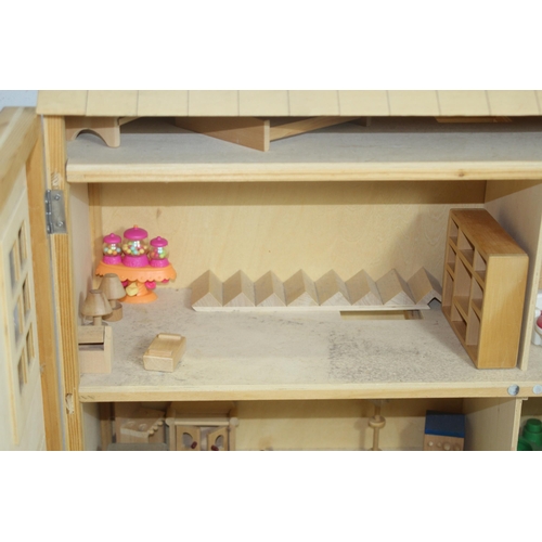517 - WOODEN DOLLS HOUSE AND FURNITURE
60 X 25 X 69CM