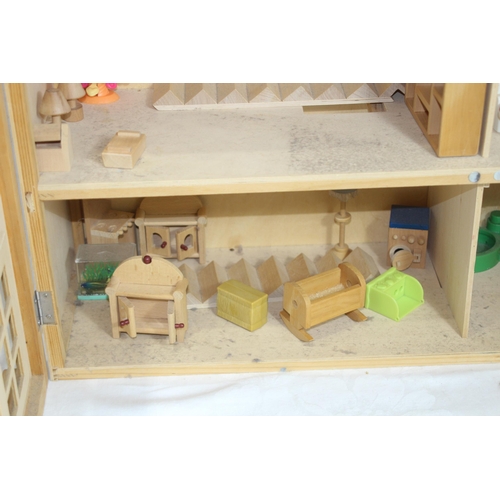 517 - WOODEN DOLLS HOUSE AND FURNITURE
60 X 25 X 69CM