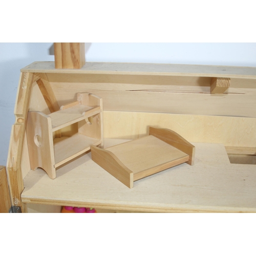 517 - WOODEN DOLLS HOUSE AND FURNITURE
60 X 25 X 69CM