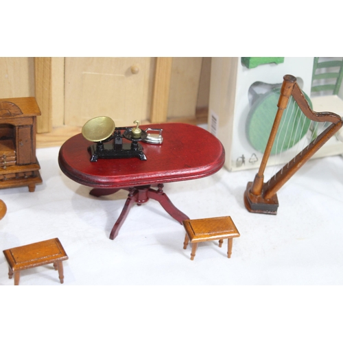 517 - WOODEN DOLLS HOUSE AND FURNITURE
60 X 25 X 69CM
