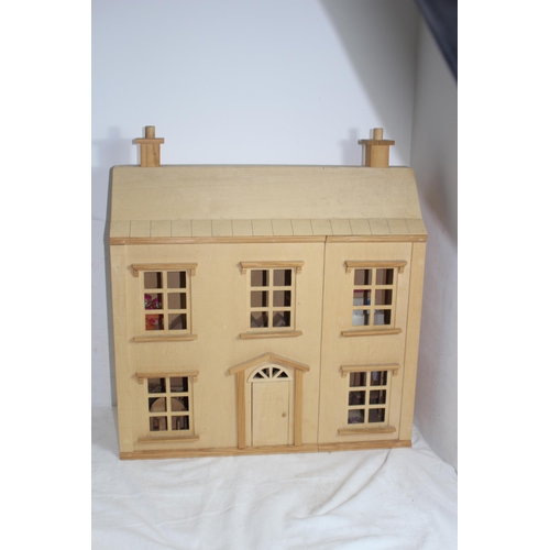 517 - WOODEN DOLLS HOUSE AND FURNITURE
60 X 25 X 69CM