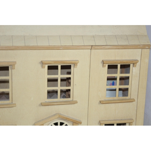 517 - WOODEN DOLLS HOUSE AND FURNITURE
60 X 25 X 69CM