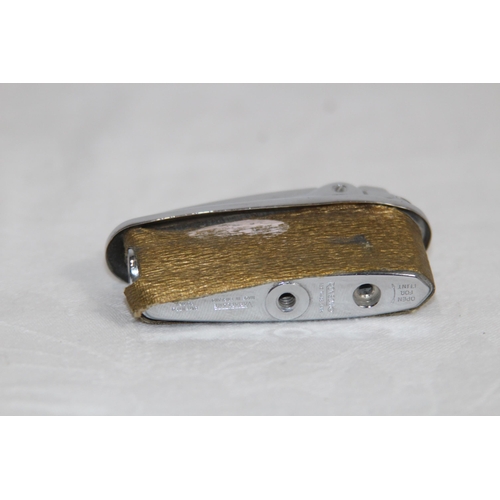 284 - ORIENTAL THEMED VINTAGE MUSICAL LIGHTER BY PRINCE, PAT NO. 2347541-2 AND OTHER SMOKING RELATED ITEMS